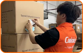 staff packing finished silicone products in boxes
