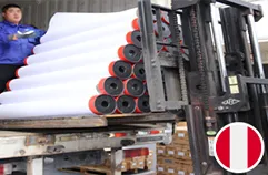 Silicone sheets with black and red core being forklifted for export to Peru