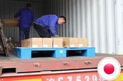 Worker handling custom silicone order for Japan