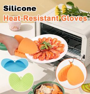 Silicone heat-resistant gloves used to handle hot food from an oven