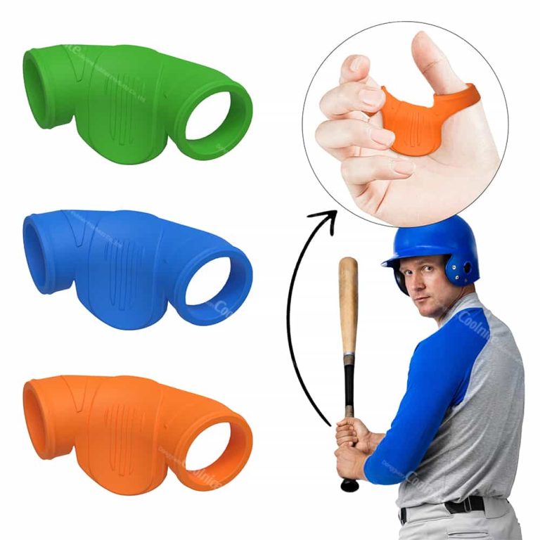 Baseball player gripping bat with thumb guard