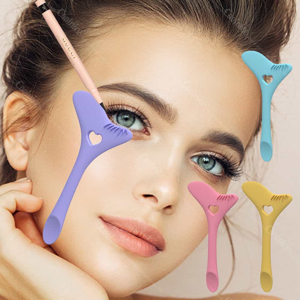 Woman using colorful silicone eyeliner stencil tool.