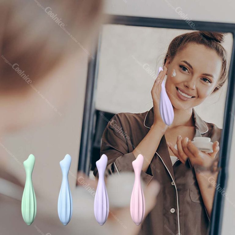 Woman applying face cream with silicone scraper