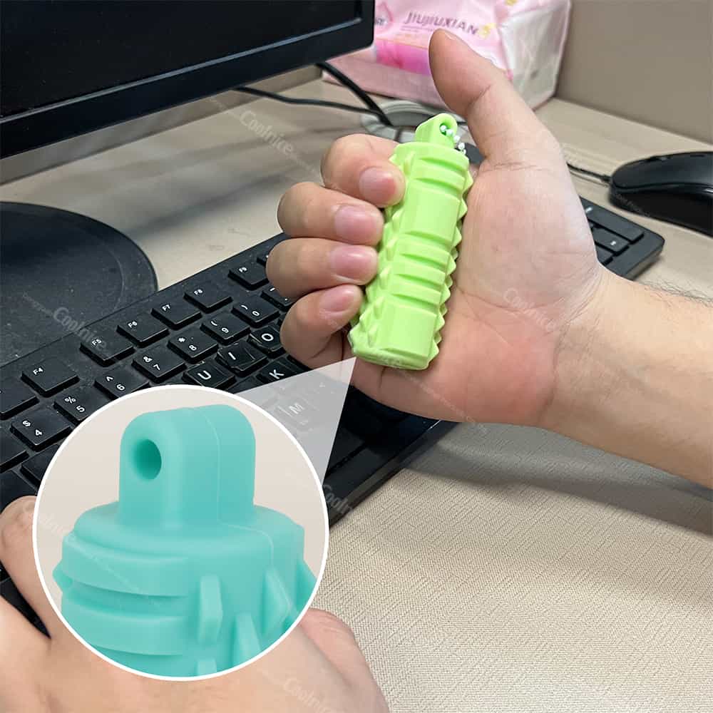 Hand using silicone massage roller on arm muscles