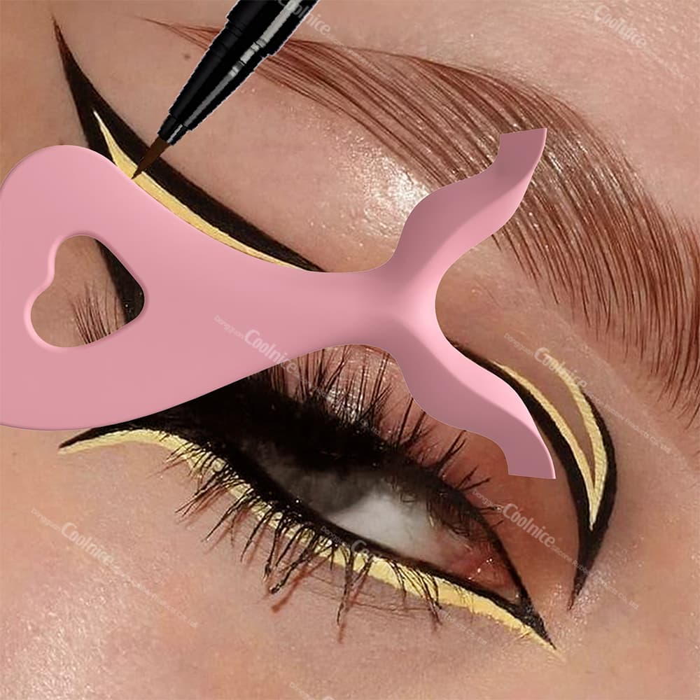 Pink eyeliner stencil assisting in bold black eyeliner application above the crease.