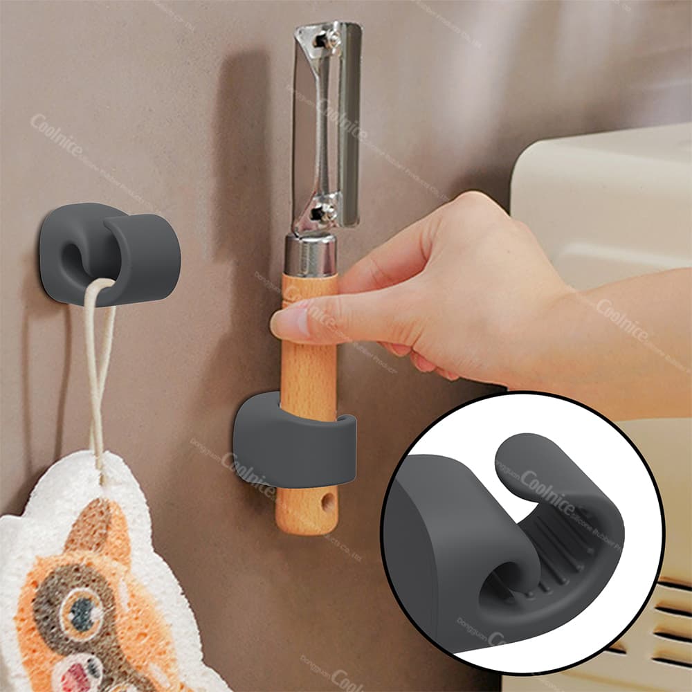 Magnetic silicone holder for tools, shown holding a vegetable peeler on a wall, with a close-up of the holder and peeler attachment.