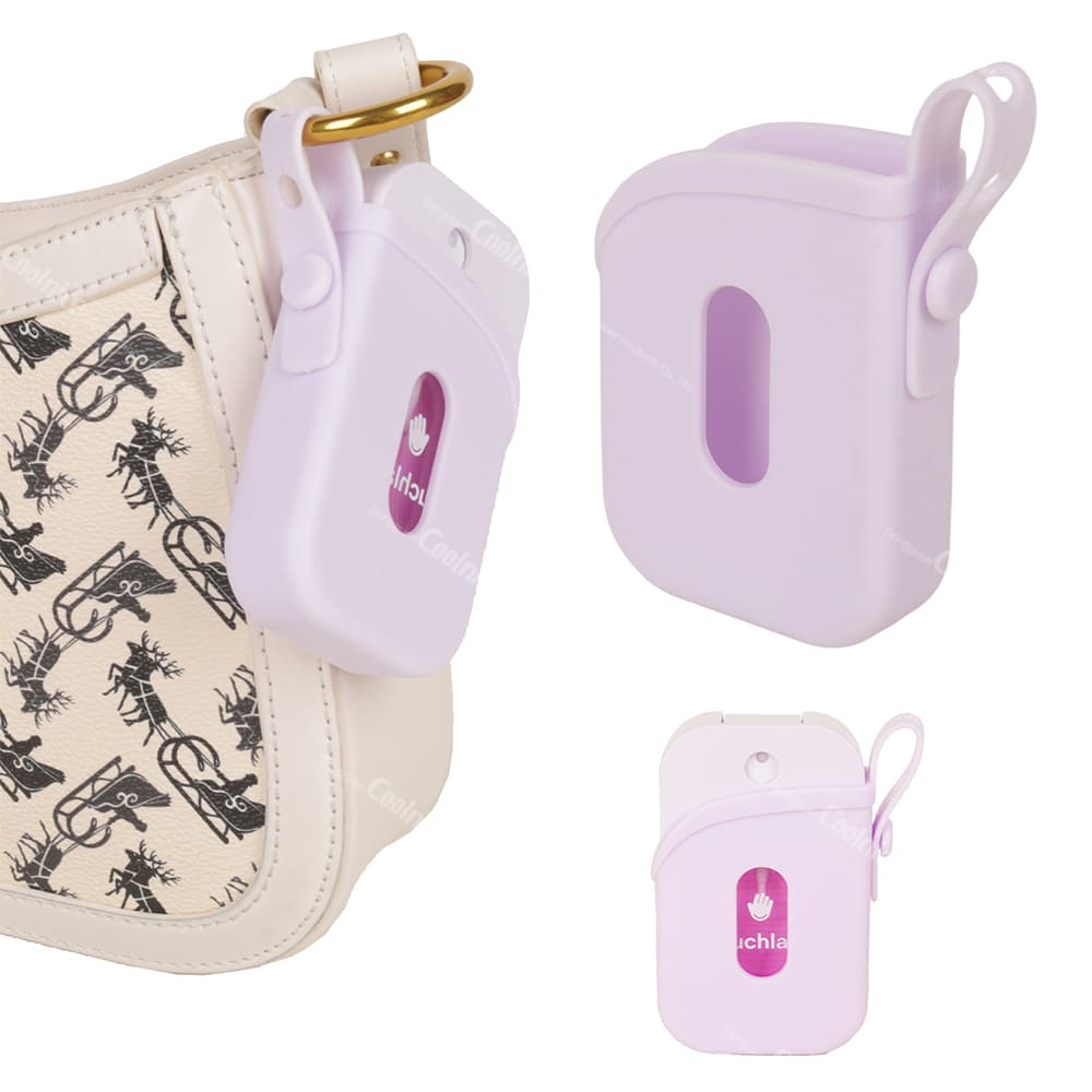 Hand sanitizer spray protector case in purple, hanging from a handbag, with a convenient hook for on-the-go use.