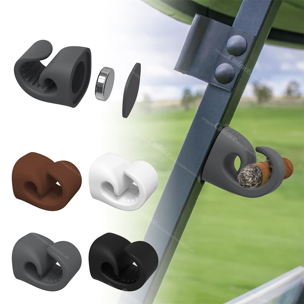 Magnetic silicone cigar holder in multiple colors (gray, brown, white, black), shown with its magnetic components and attached to a metal surface holding a cigar.