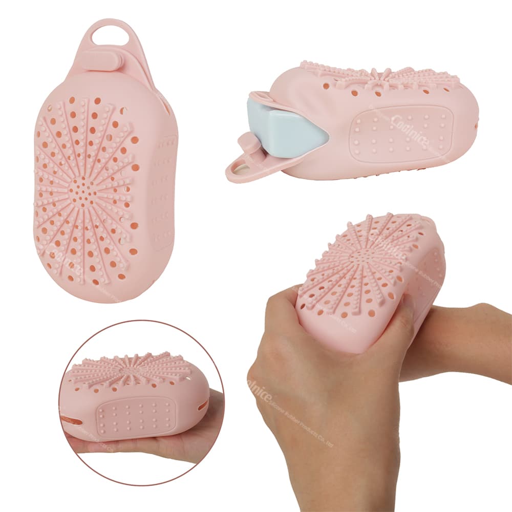 Silicone soap holder in pink, showcasing its flexible design and textured grip. Features a hand squeezing the soap holder, demonstrating its elasticity and easy soap insertion.