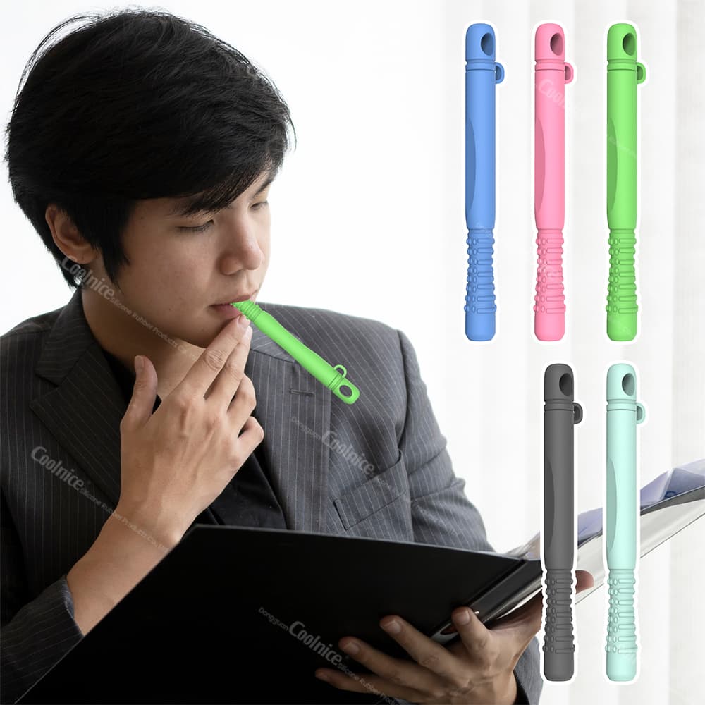 Person holding a green silicone essential oil chewing stick, with other color options (pink, blue, gray, mint) shown in the background.