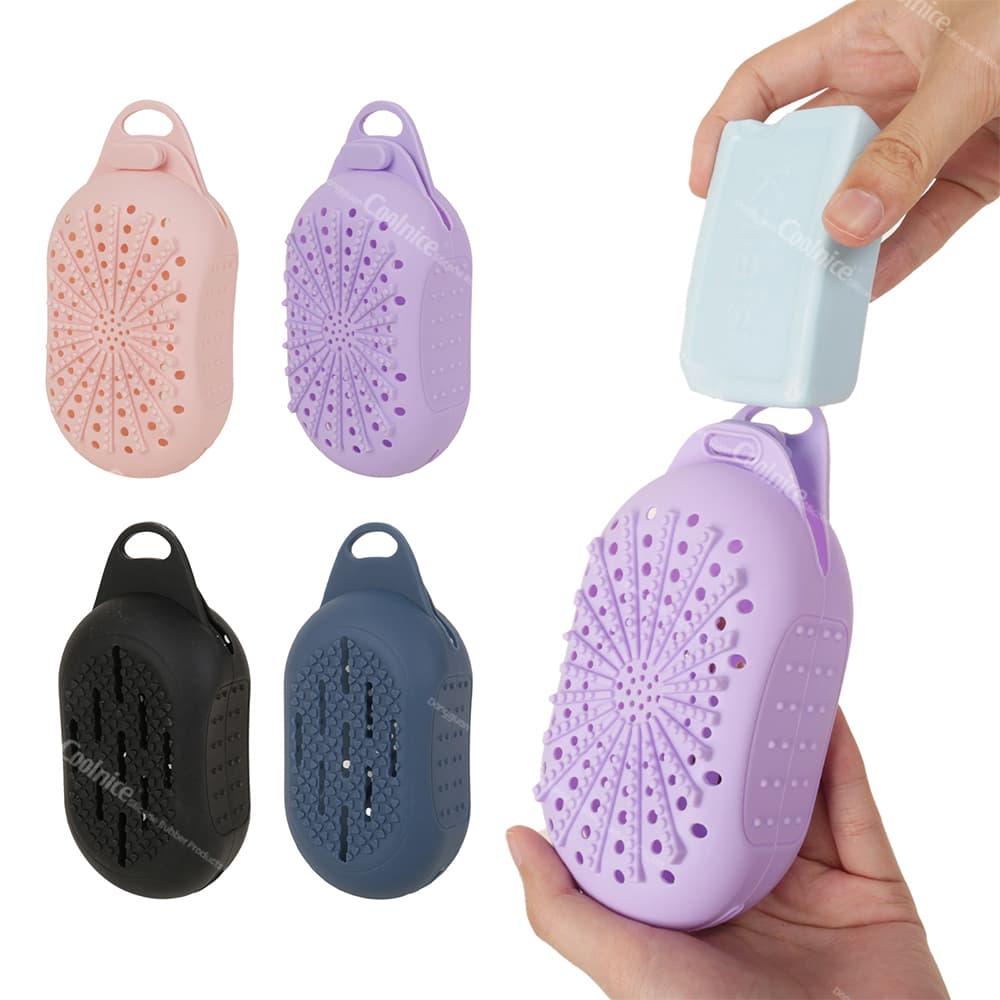 Silicone soap dish in pink, purple, black, and blue, with a person removing soap from the holder. Features ventilation holes for drying soap.