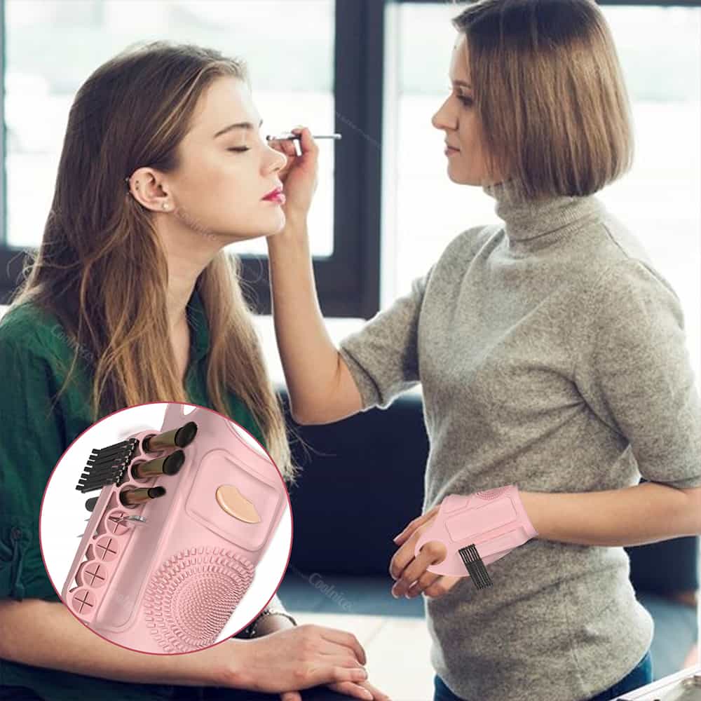 Makeup artist using white silicone wrist palette with brush slots.