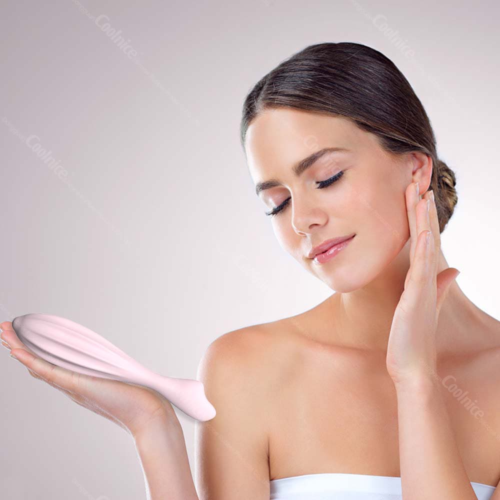 Woman using silicone face massage tool for skincare