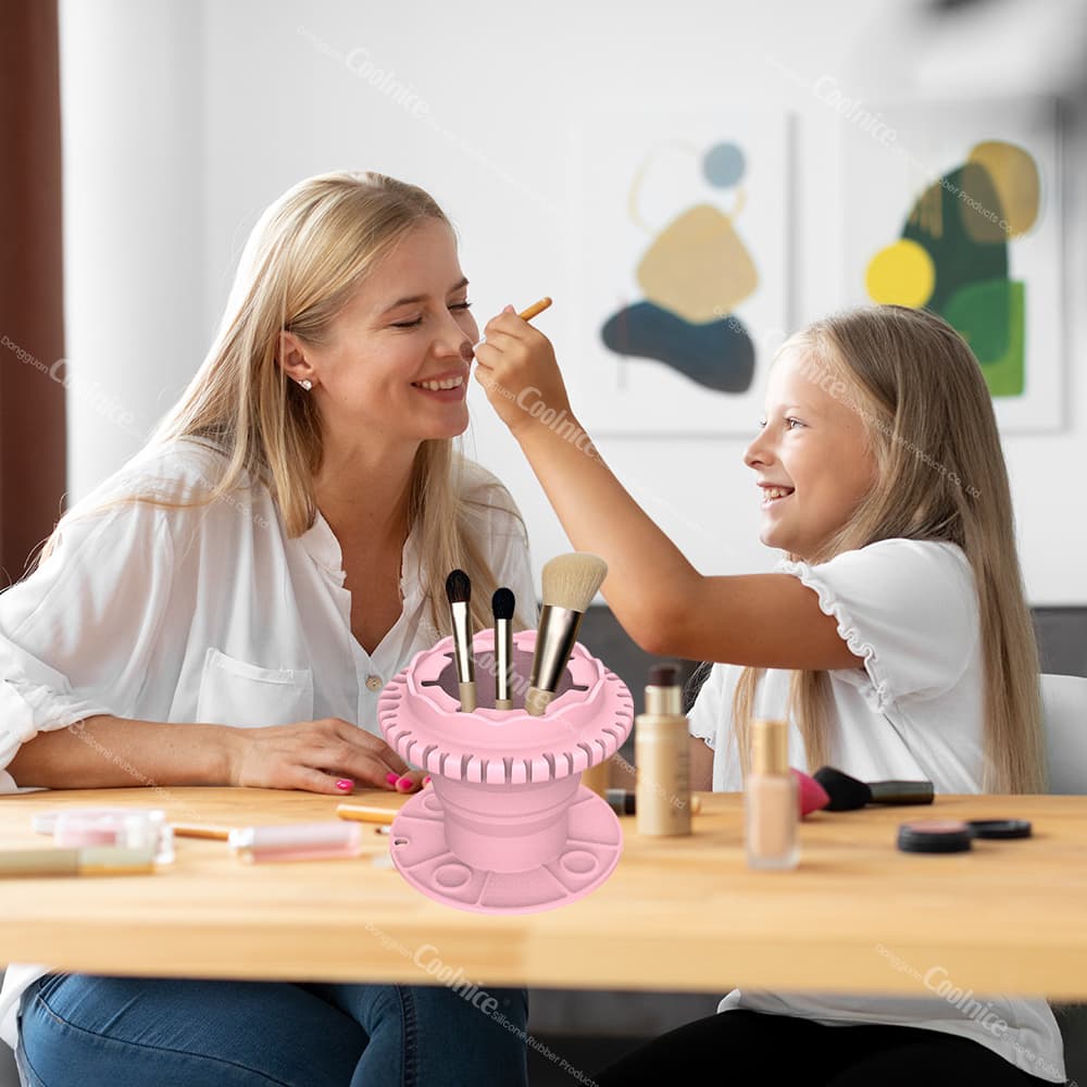 Mother and daughter using silicone brush holder