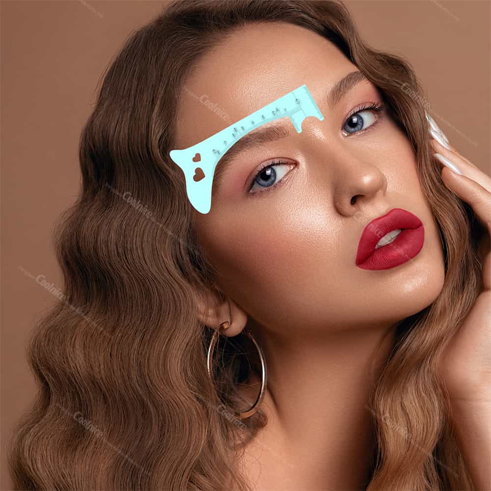 Model using blue eyebrow shaping ruler for mapping brows