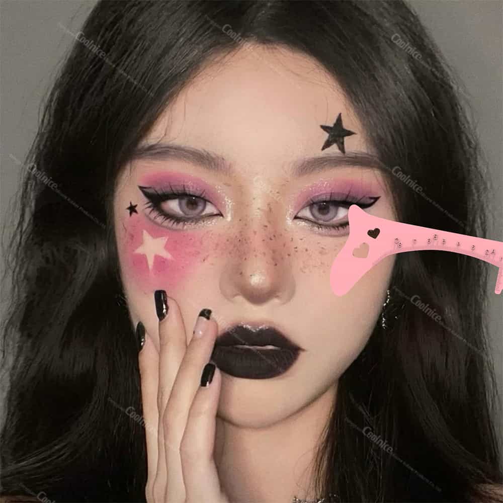 Makeup model using pink eyebrow ruler for creative eye makeup