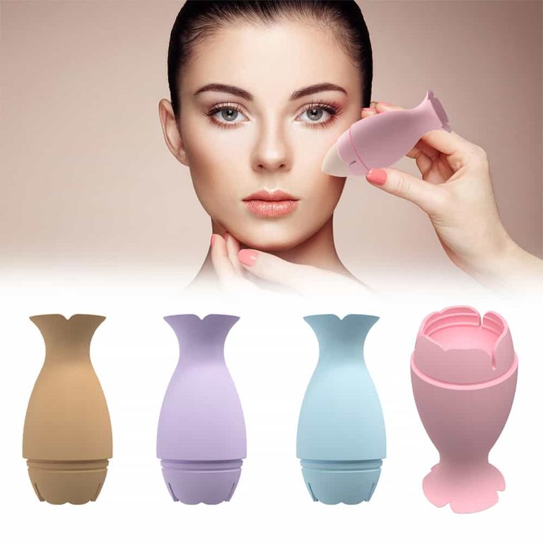 Woman applying foundation with silicone sponge holder