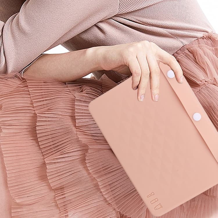 Pink silicone bag held by woman in elegant dress