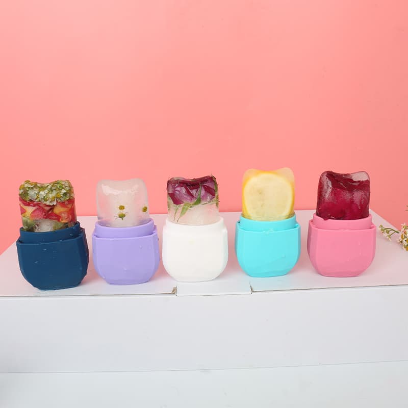 Ice cube rollers filled with natural fruit and flower ingredients