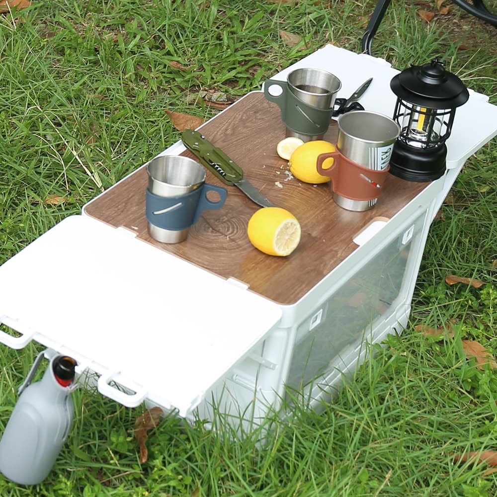 Close-up of wooden tabletop on foldable camping storage box
