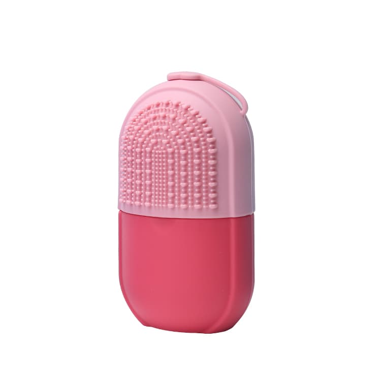 Pink silicone 3 in 1 ice cube roller with textured brush