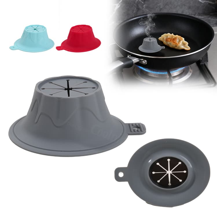 Gray silicone steamer heating dumplings on a pan