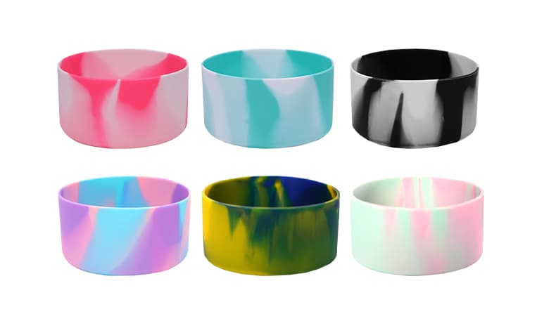 Silicone tumblers with mixed color designs in vibrant swirls, featuring a variety of color combinations.
