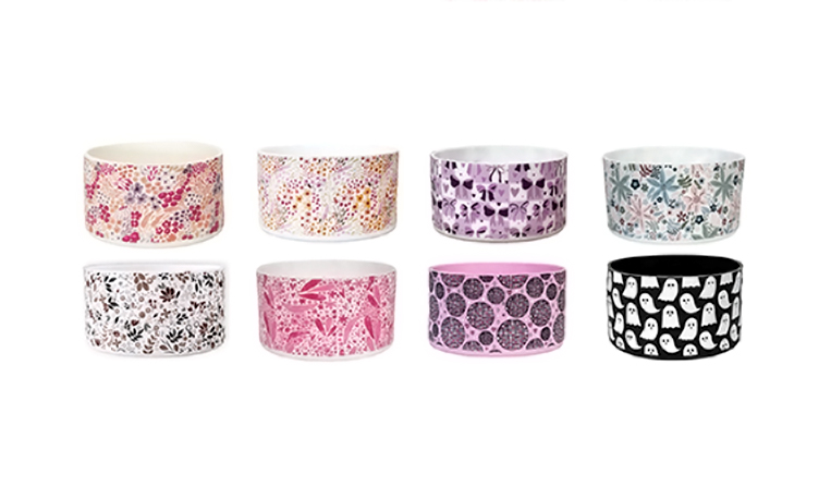 Custom silicone tumbler sleeves with water transfer printing, featuring various colorful patterns and designs.