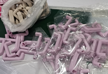 Bulk packaging of silicone handle protectors for drinkware, ready for shipping.