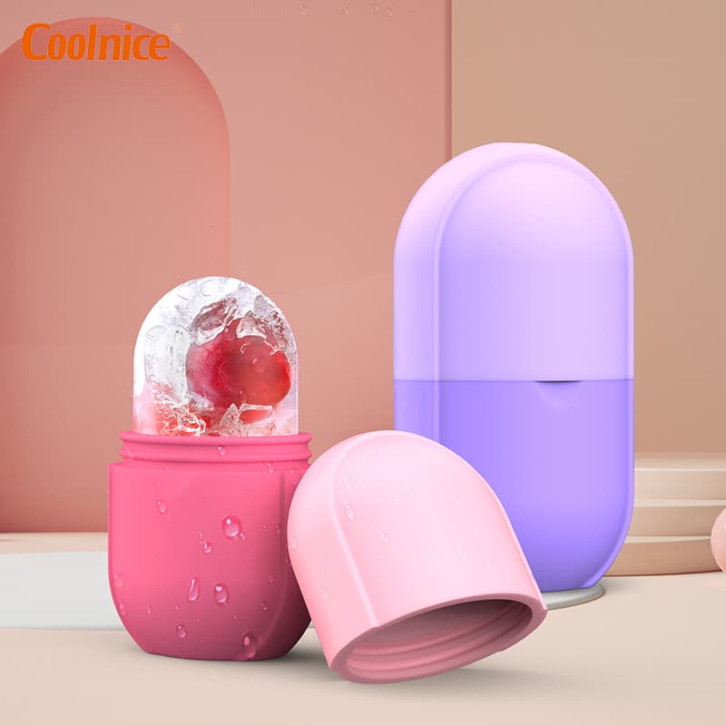 Pink and purple silicone facial ice rollers with fruit ice cubes