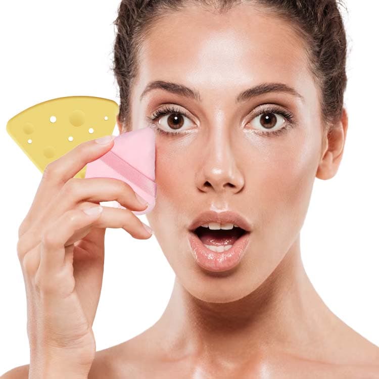 Model using makeup puff with silicone puff holder in background