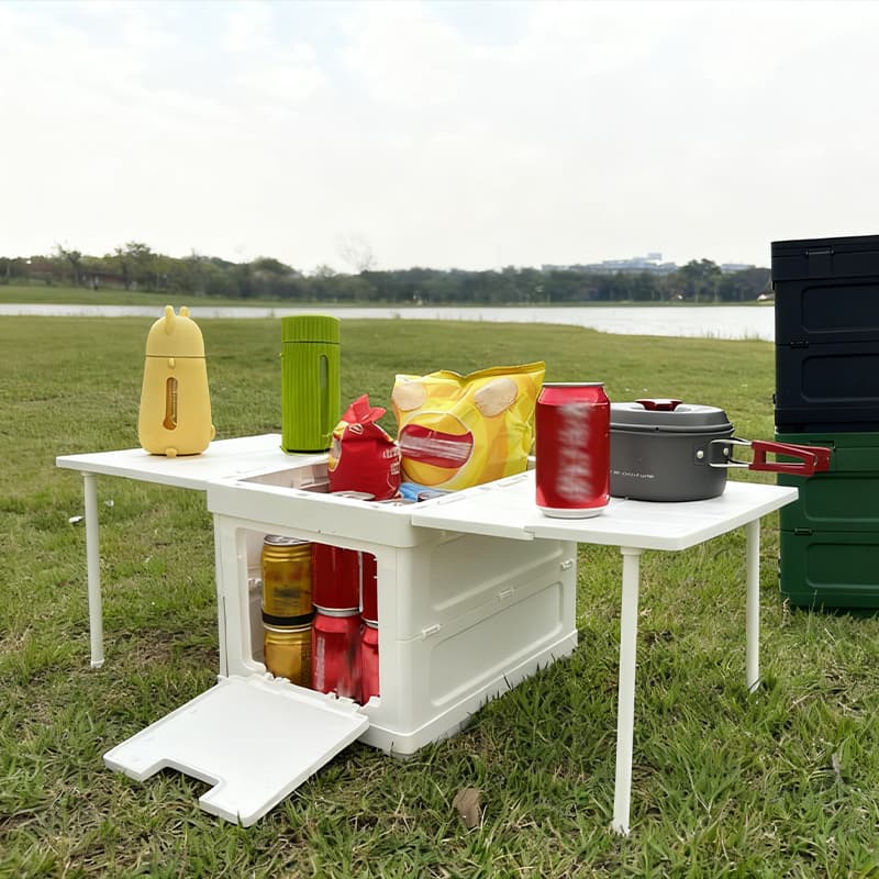 Custom outdoor folding storage box with built-in table for camping cooking setup