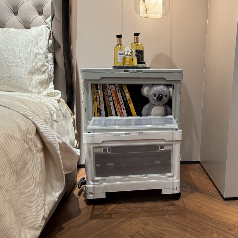 Custom folding storage box used as bedside organizer in bedroom