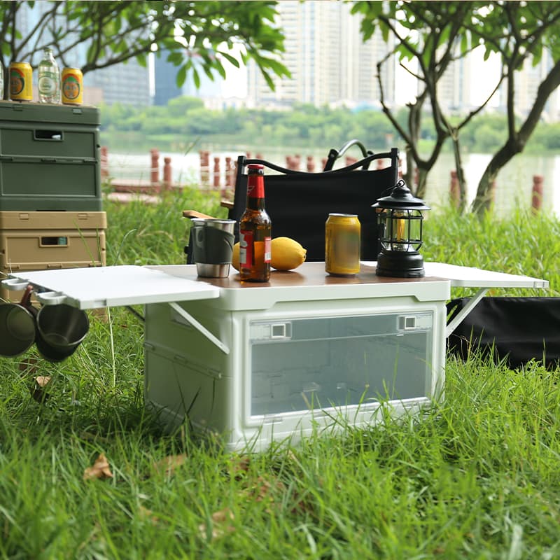 Custom outdoor folding storage box with extendable table for camping setup