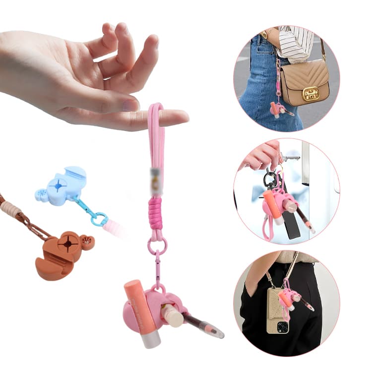 Mini silicone holder clip attached to bag strap