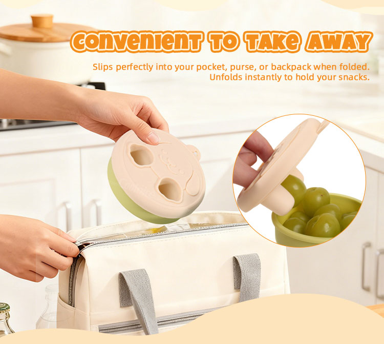 Portable collapsible silicone snack container being placed into a bag for travel convenience