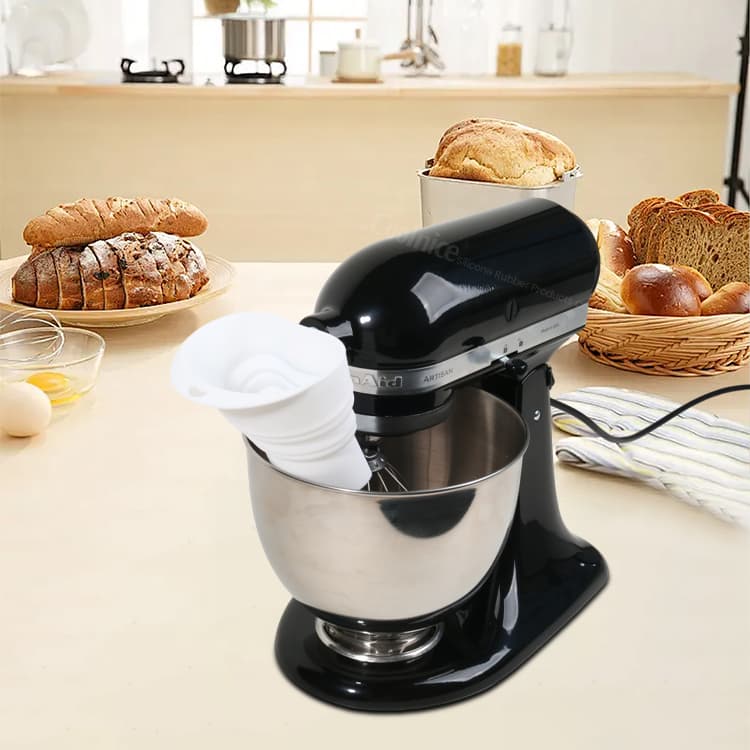 Extended flour funnel used during bread mixing