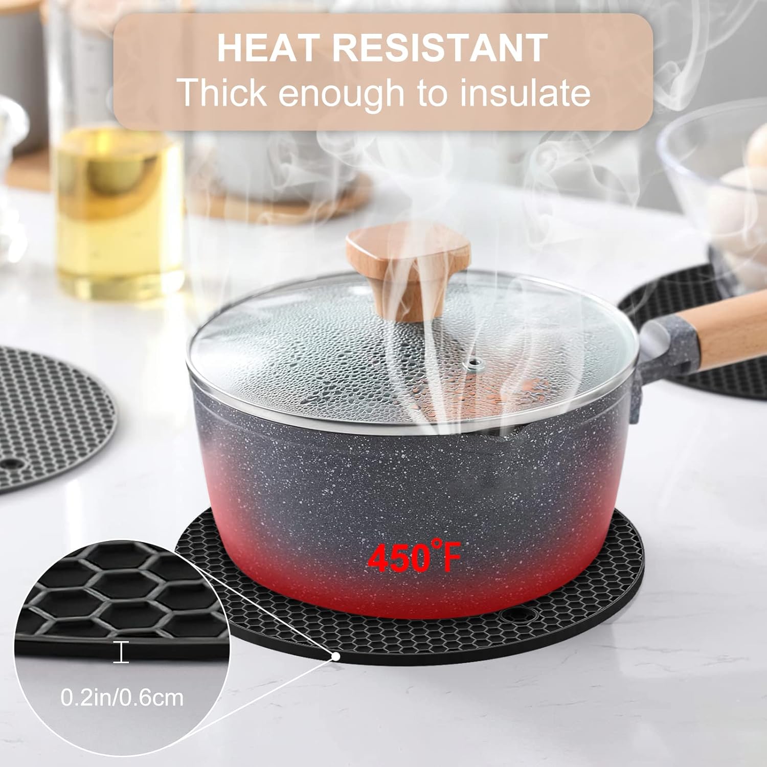 Heat-resistant silicone trivet withstands high temperatures up to 450°F, ideal for protecting countertops